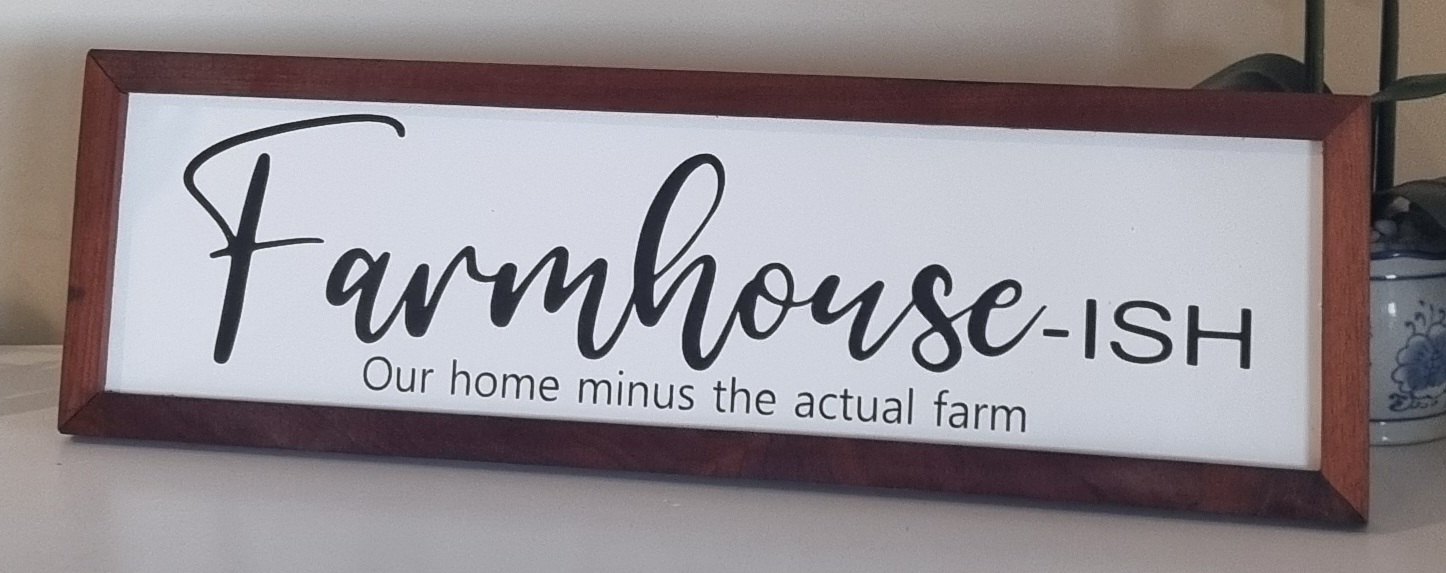 Framed Farmhouse-ish timber sign displayed at home